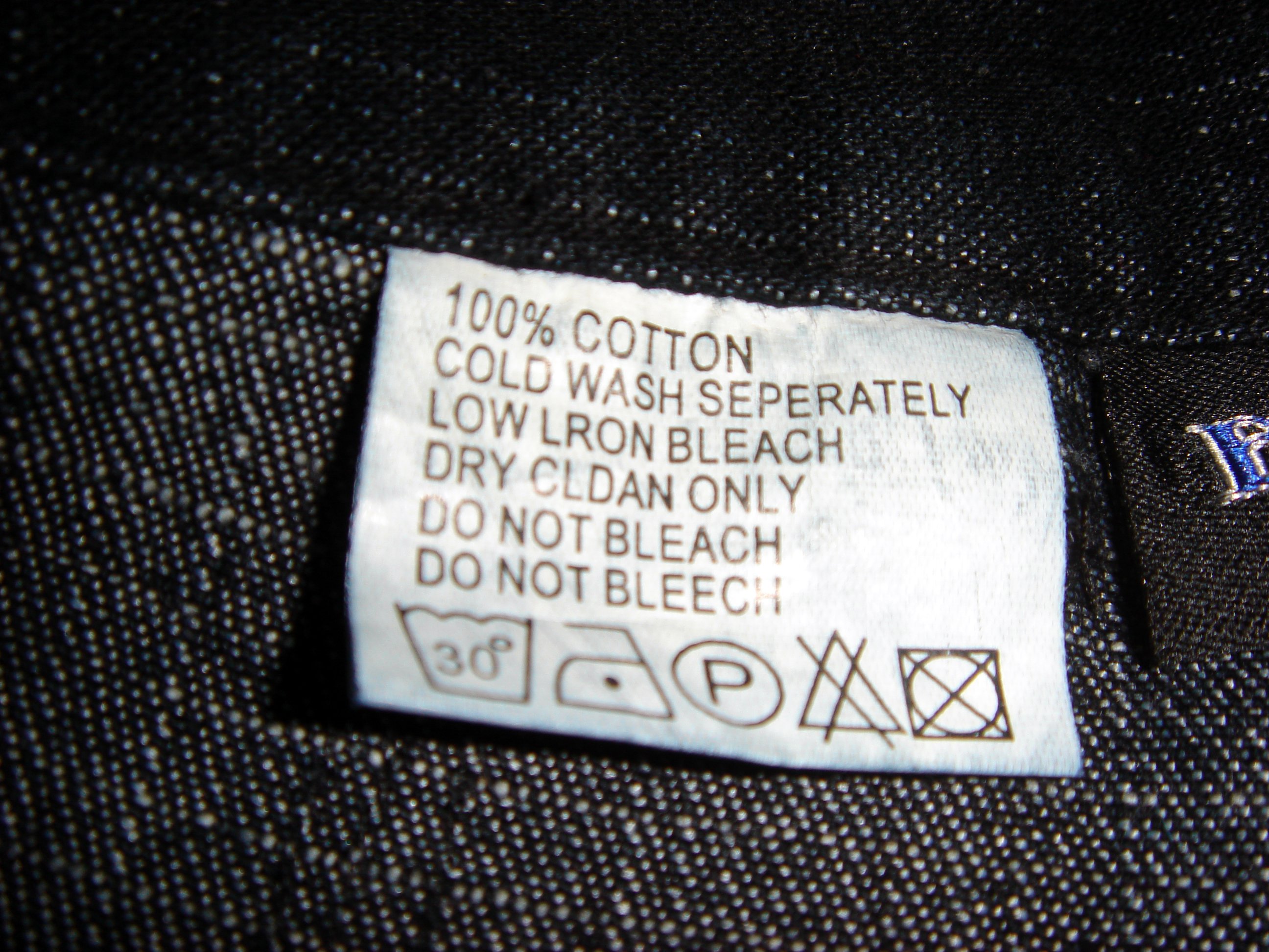 Close-up of a garment's care and fiber content label